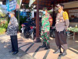 Pasca Arus Balik Mudik Lebaran Bhabinkamtibmas dan Perangkat Desa Sanur Kaja Laksanakan Pendataan Warga